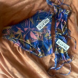 Skate bathing suit never worn. New with tags